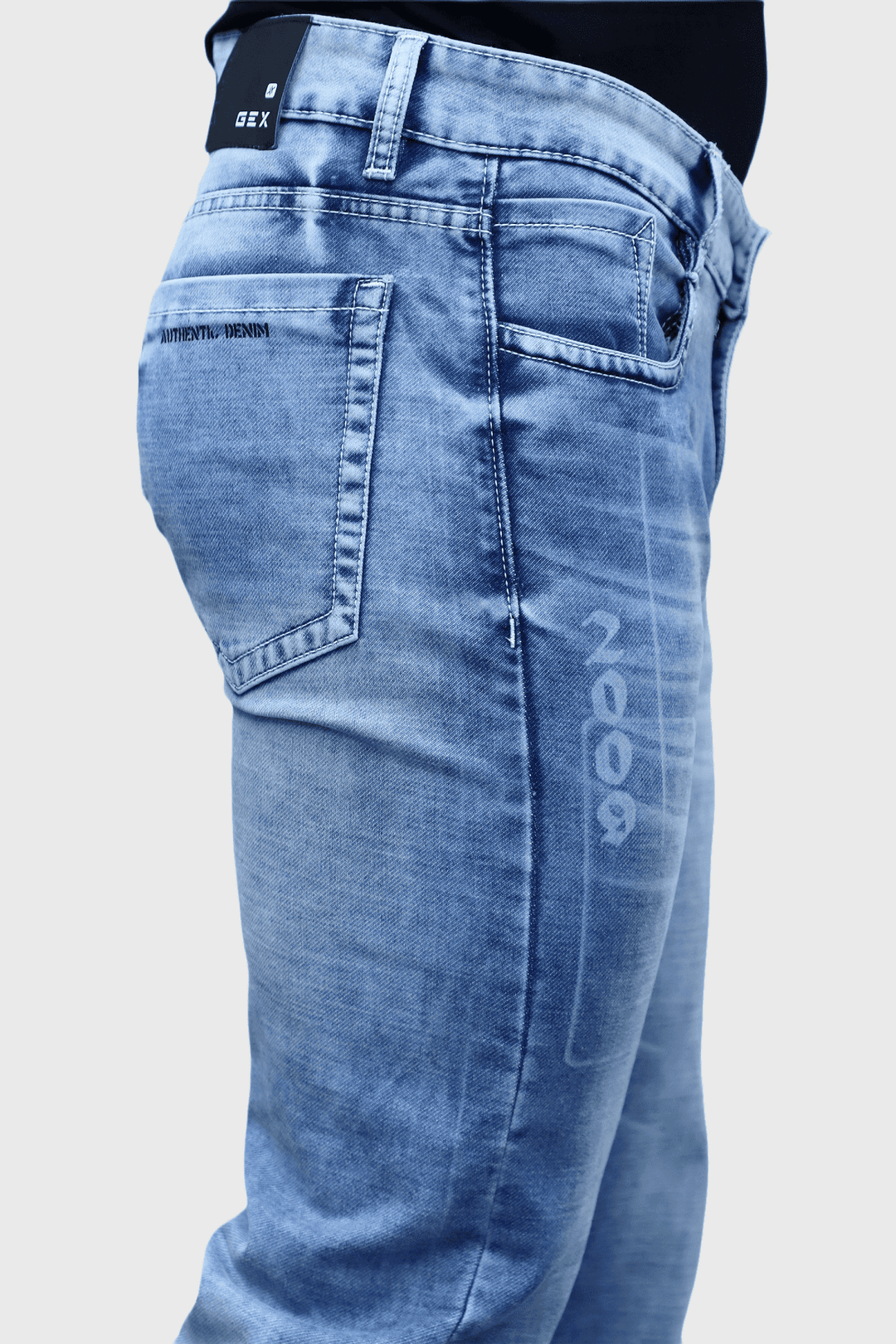 Close up of blue washed stretchable denim fabric in slim fit men's jeans E-16