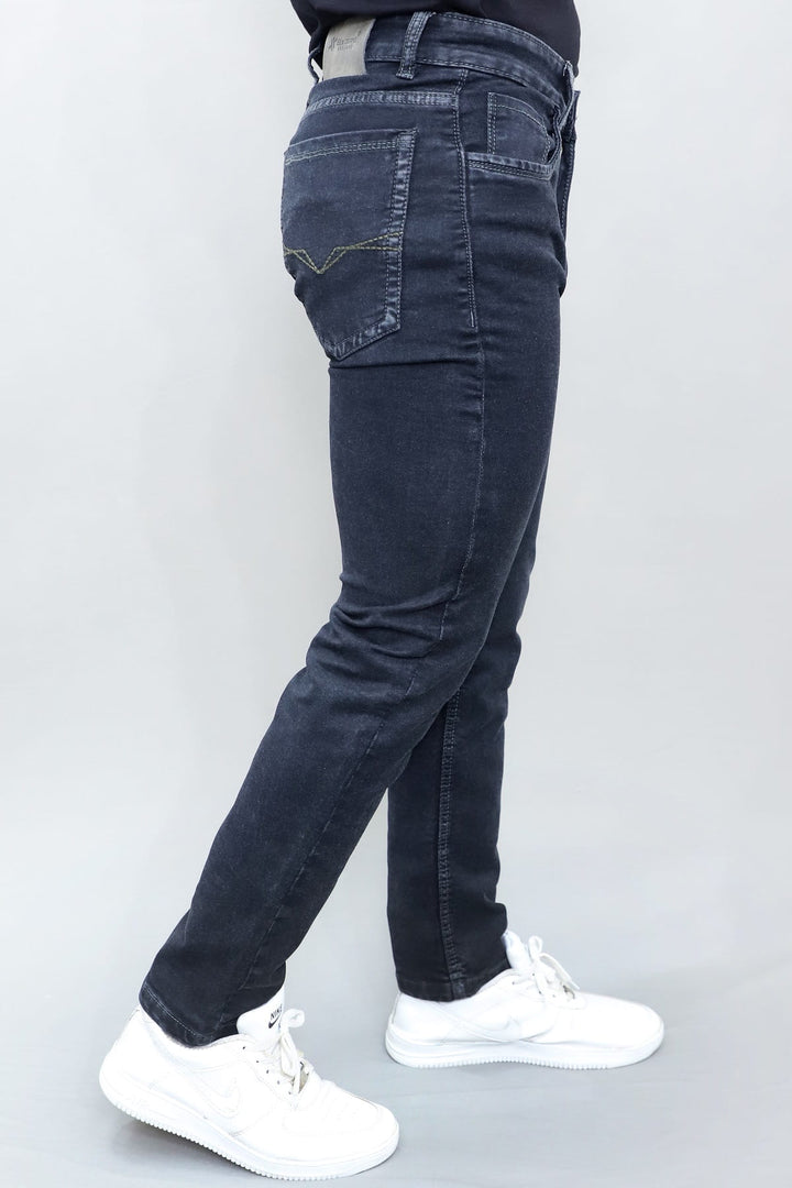 Side profile of Gex Jeans G797 dark blue denim for men