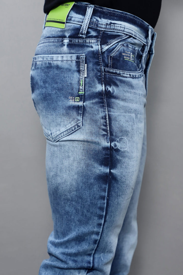 Detailed view of faded texture and stitching on Gex Jeans G823