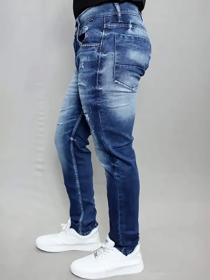 Close-up of heavy wash texture and stitching on Gex Jeans G828 Navy