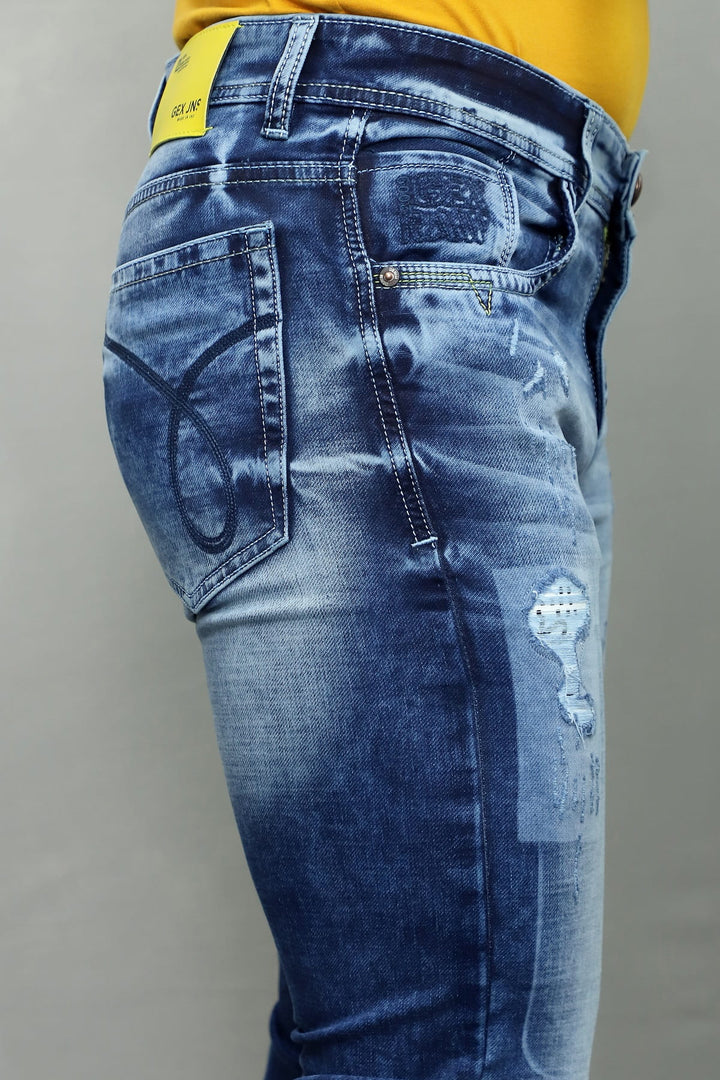 Back view of Gex Jeans G847 Slim Fit Denim with yellow waist patch