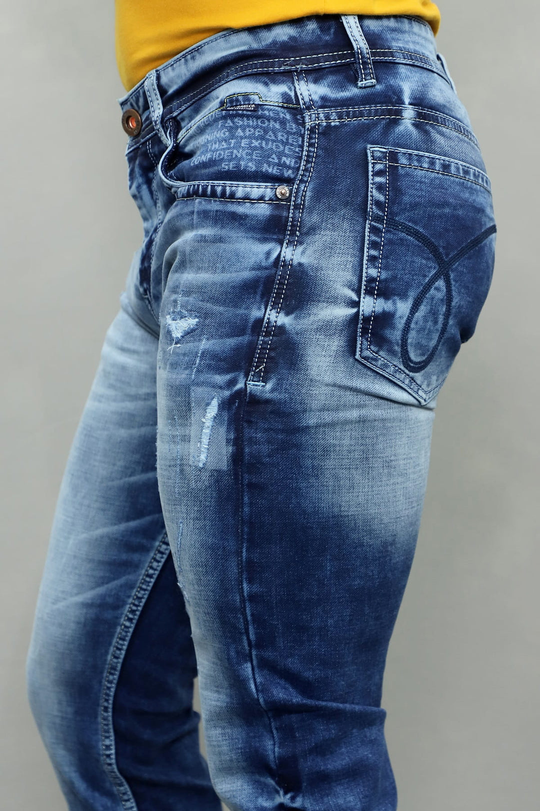Detailed texture and wash of Gex Jeans G847 light blue patched denim