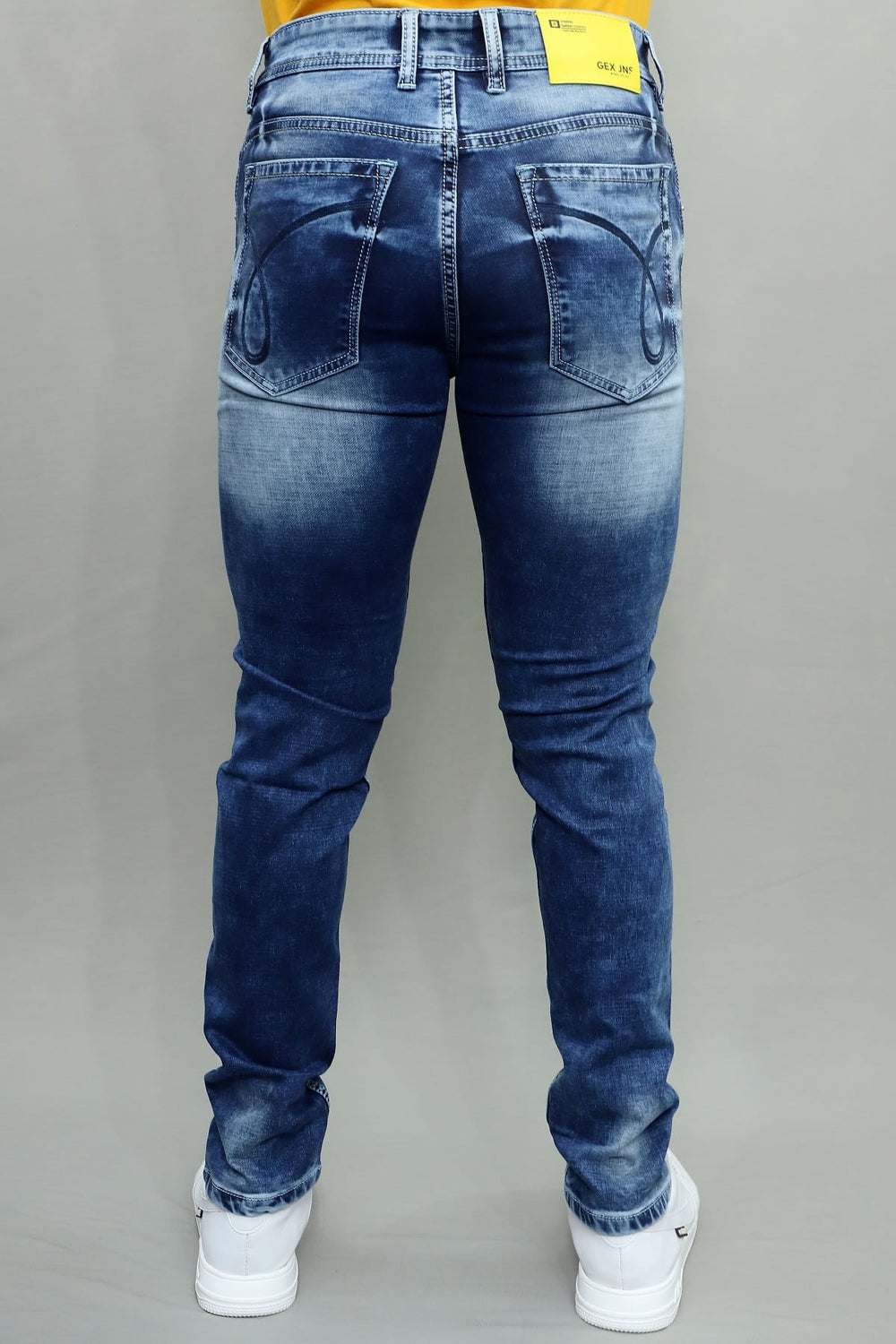 Side view of Gex Jeans G847 light blue denim showing urban patch details