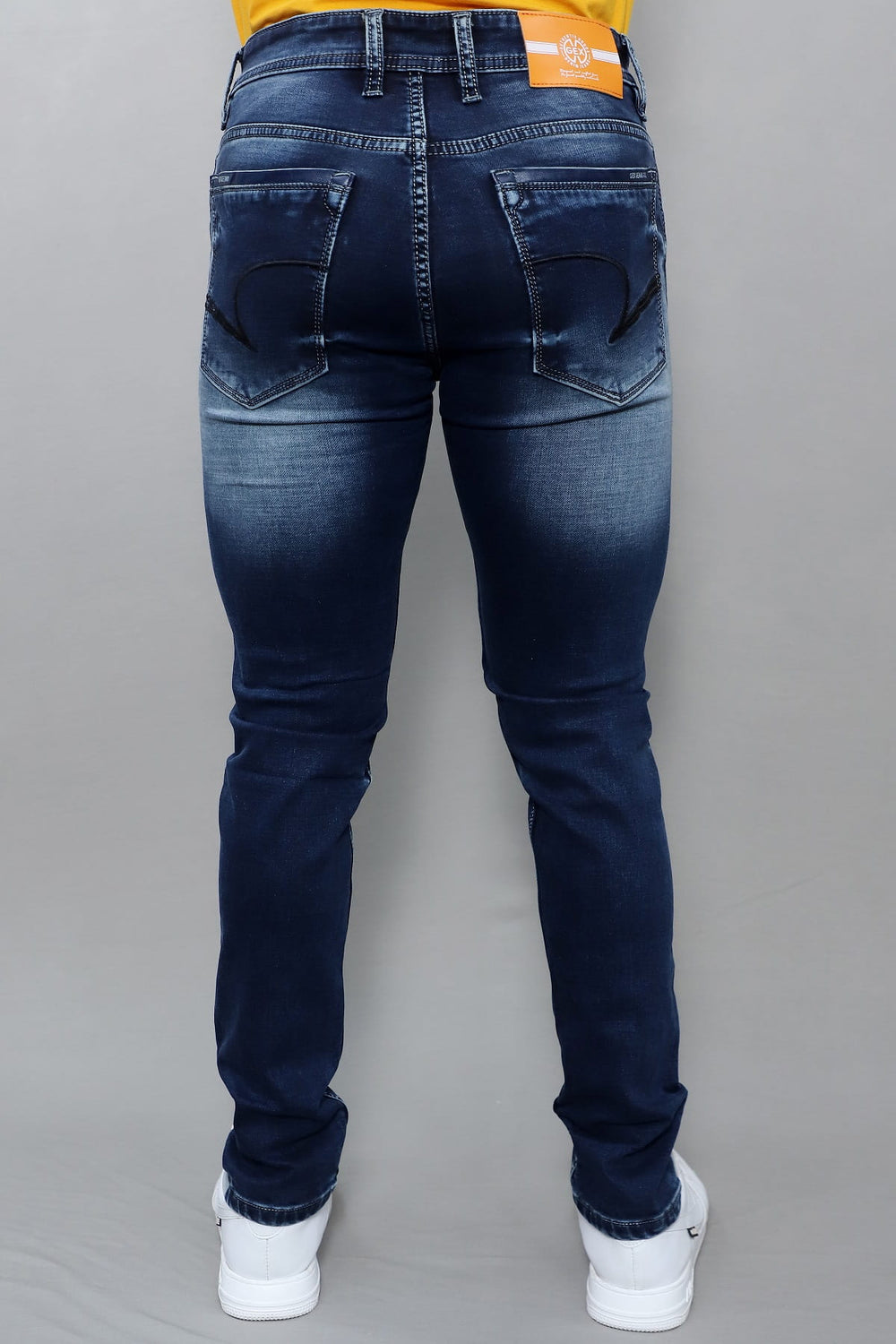 Side profile of Gex Jeans G858 midnight blue denim showing slim fit silhouette
