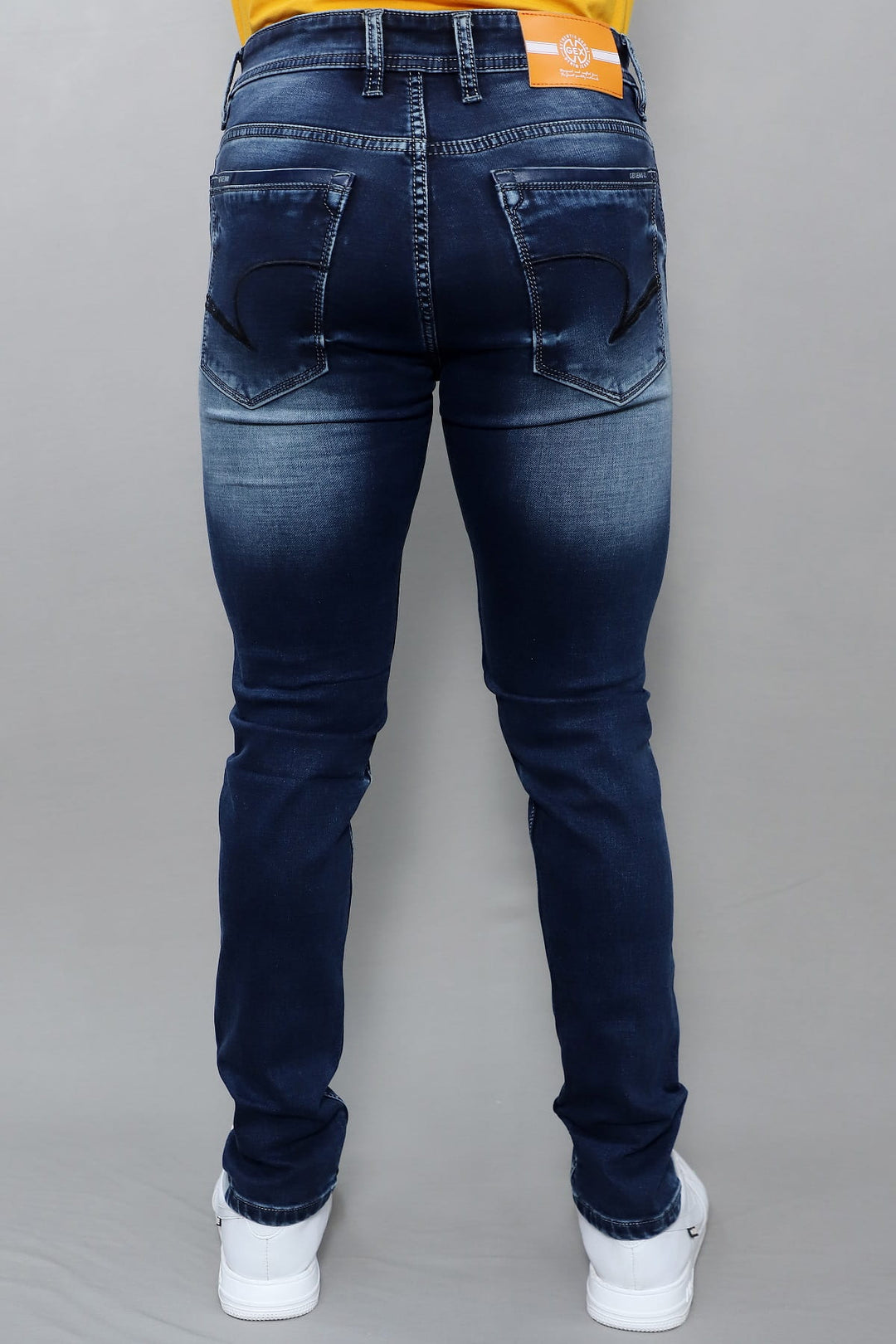 Side profile of Gex Jeans G858 midnight blue denim showing slim fit silhouette