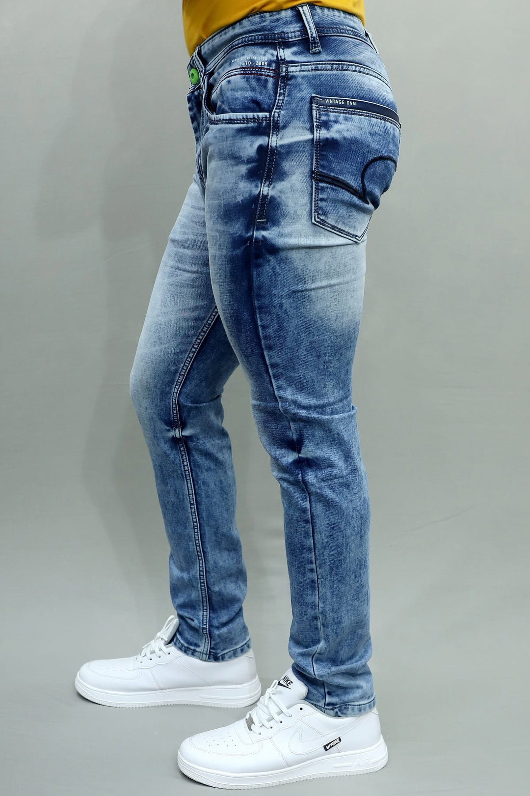 Full length side view of Gex Jeans G858 vintage blue stretchable denim