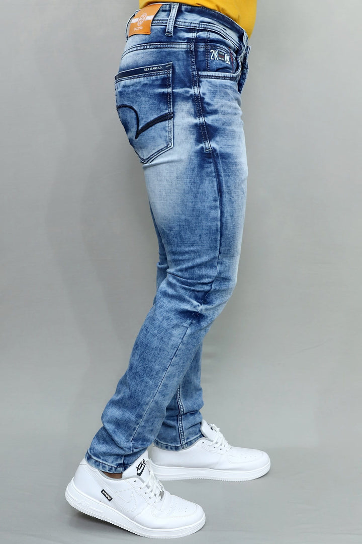 Close-up of Gex Jeans G858 waist with orange patch and green accents