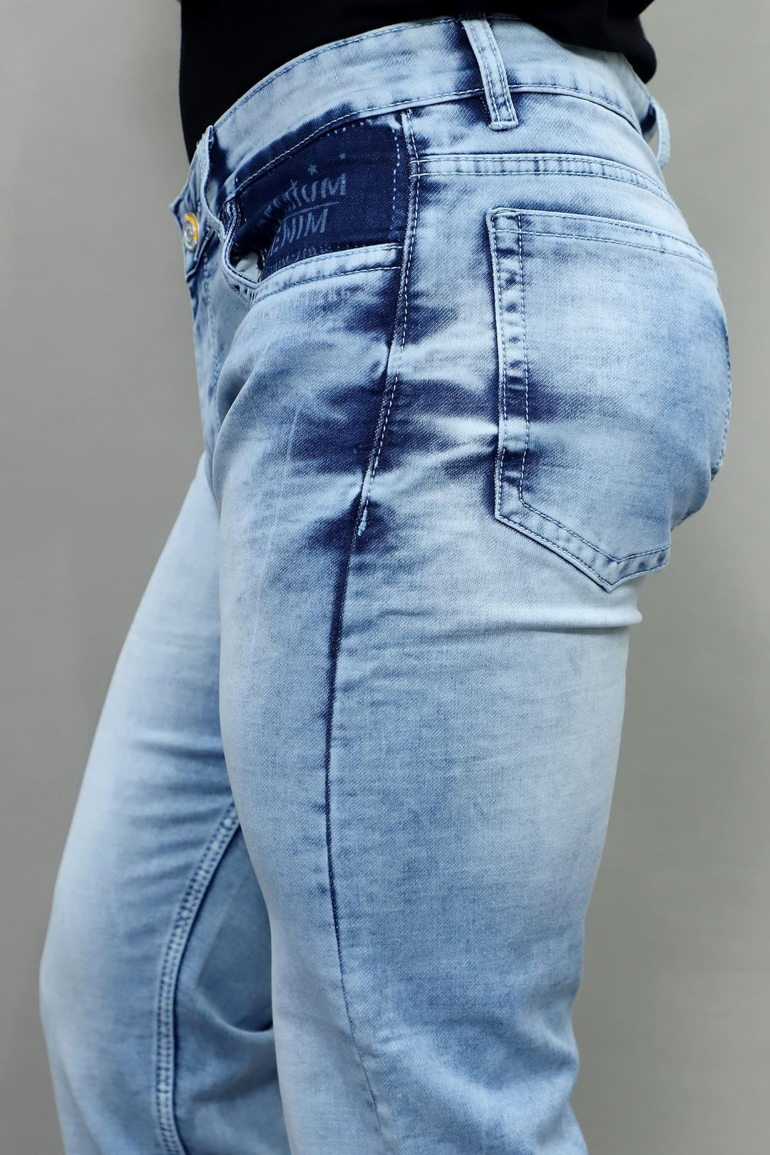 Waist and pocket detail of GEX men's slim fit premium light blue washed stretchable denim jeans E-14