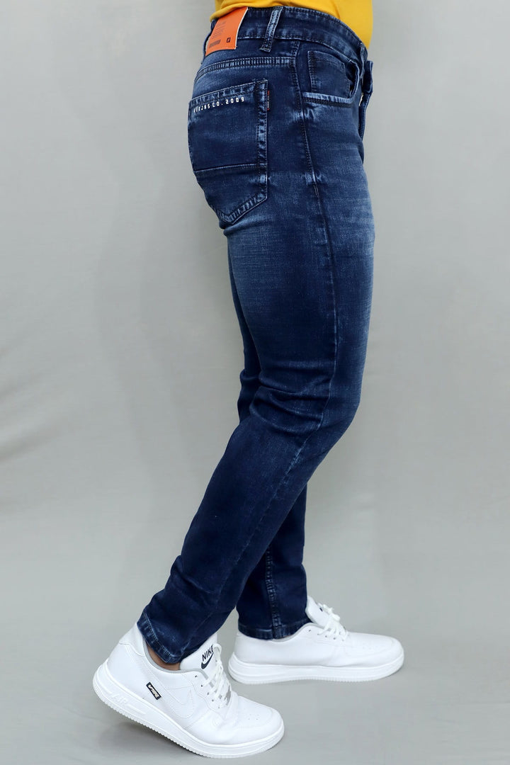Close up of light blue washed stretchable denim fabric in GEX men's slim fit jeans E-14