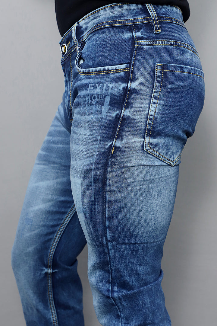 Model wearing Gex men regular mid rise blue denim jeans article no Gex G946 styled for casual and smart casual look
