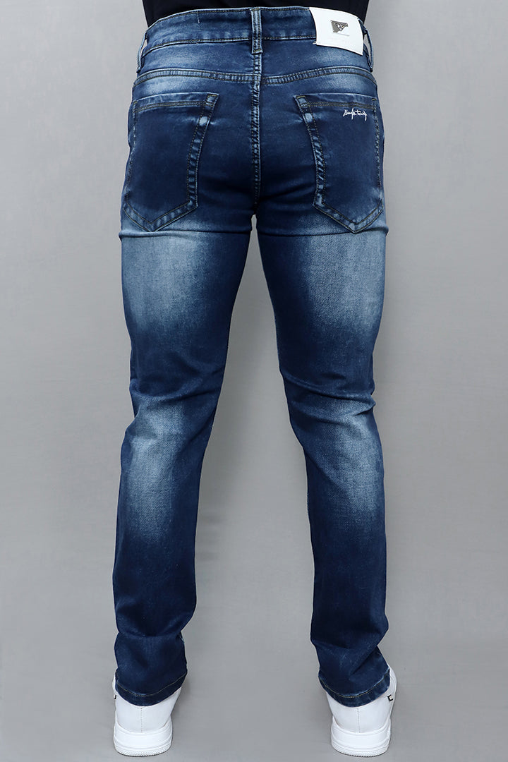 GEX slim fit denim jeans for men article no E19 side view with stylish slim leg cut in blue denim fabric