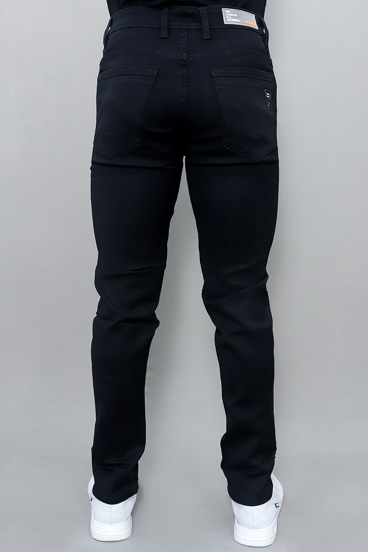 Men regular mid rise black denim jeans side view with comfortable everyday fit