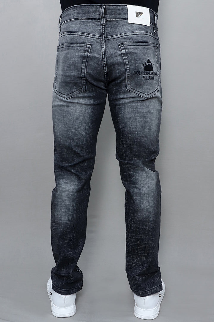 Close up of men regular mid rise black jeans article no G1003 Black showing premium black denim fabric texture