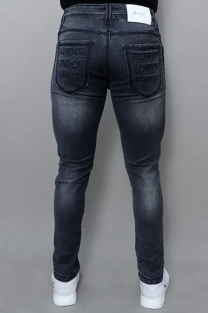 Close up of men regular mid rise black stretchable denim jeans article no GK371 BLACK showing premium stretchable fabric texture