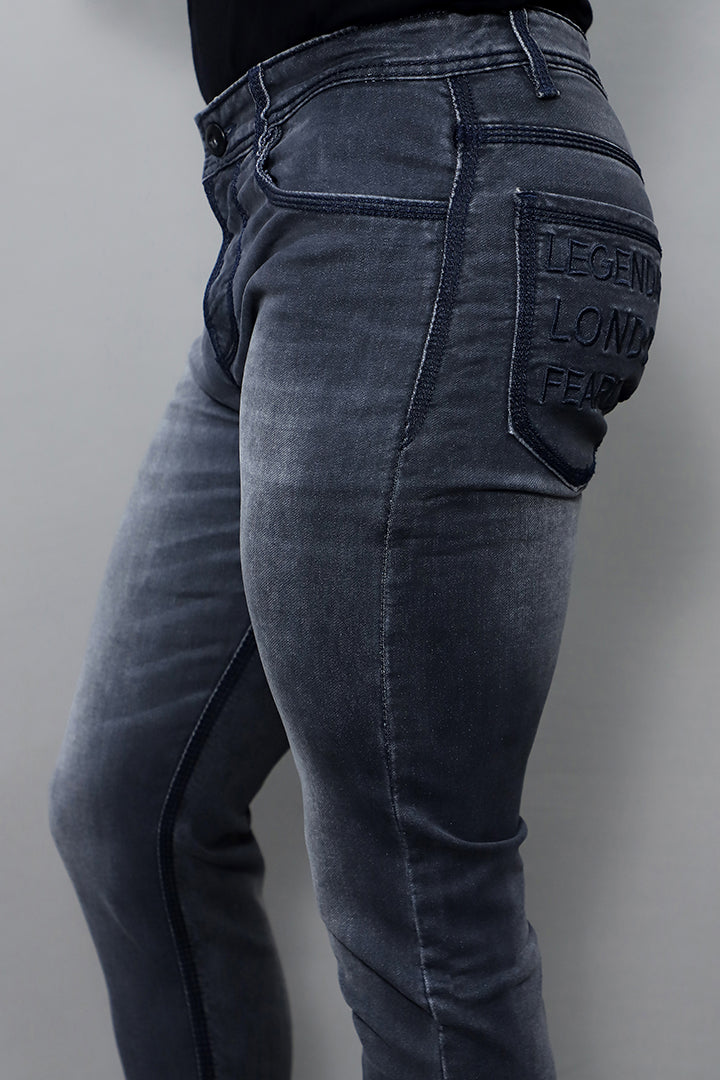 Model wearing men regular mid rise black stretchable denim jeans article no GK371 black color styled for casual and smart casual look