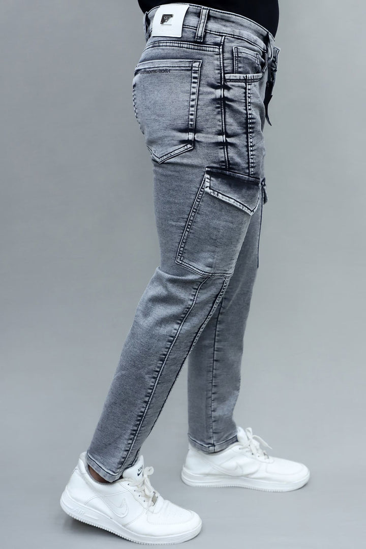 close up of stretchable dark grey fabric in men's slim fit 6 pocket cargo jeans E15