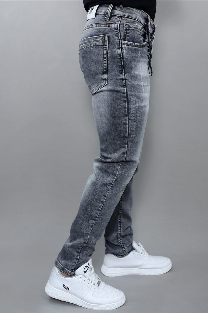Waist and pocket detail of men's premium grey washed slim fit denim jeans E19