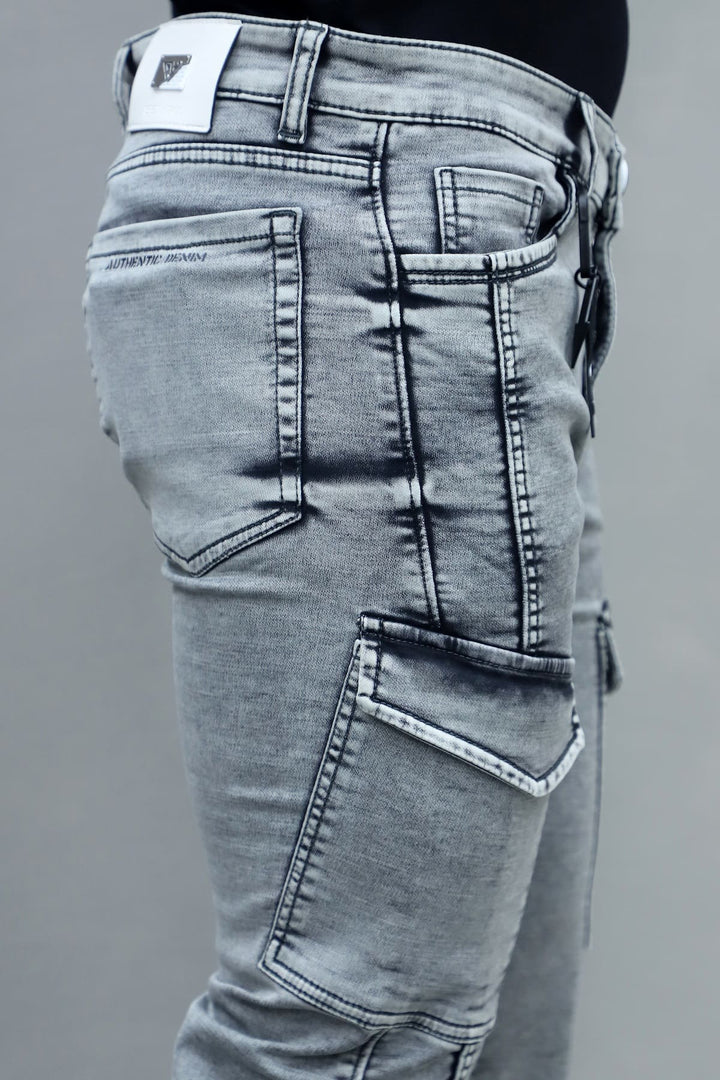 Close up of light grey stretchable fabric in men's slim fit 6 pocket cargo jeans E-15