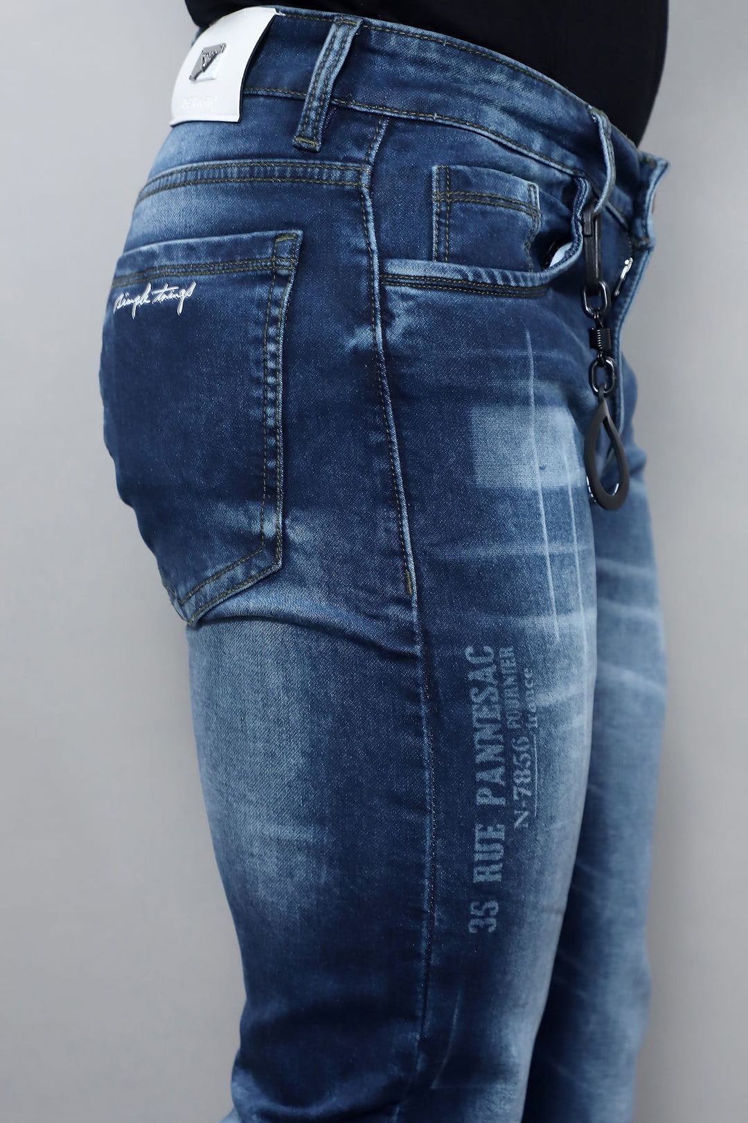 Full length view of men's premium slim fit dark blue washed stretch jeans E19