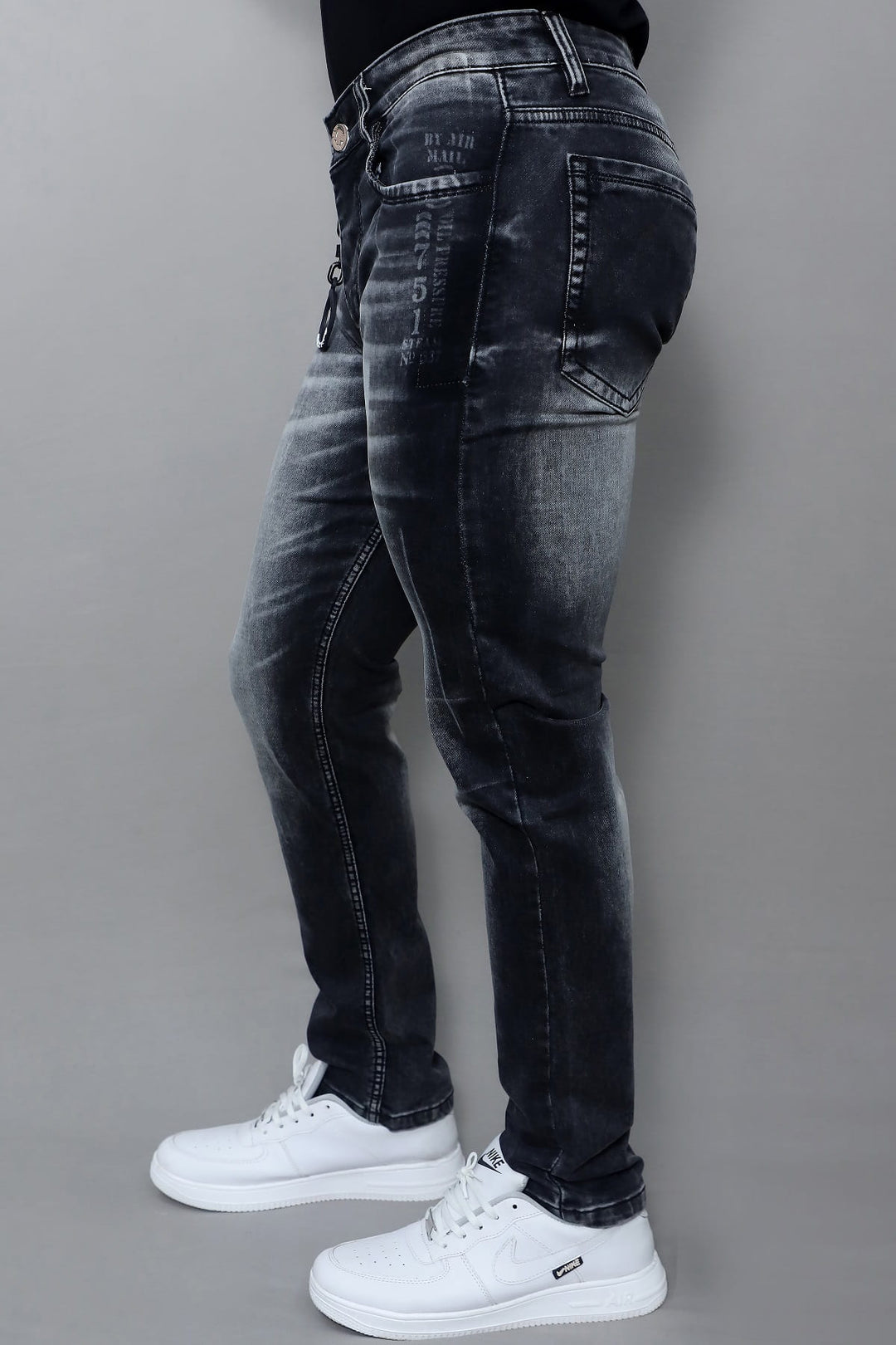 Side view of men's premium slim fit dark grey washed stretch jeans E19