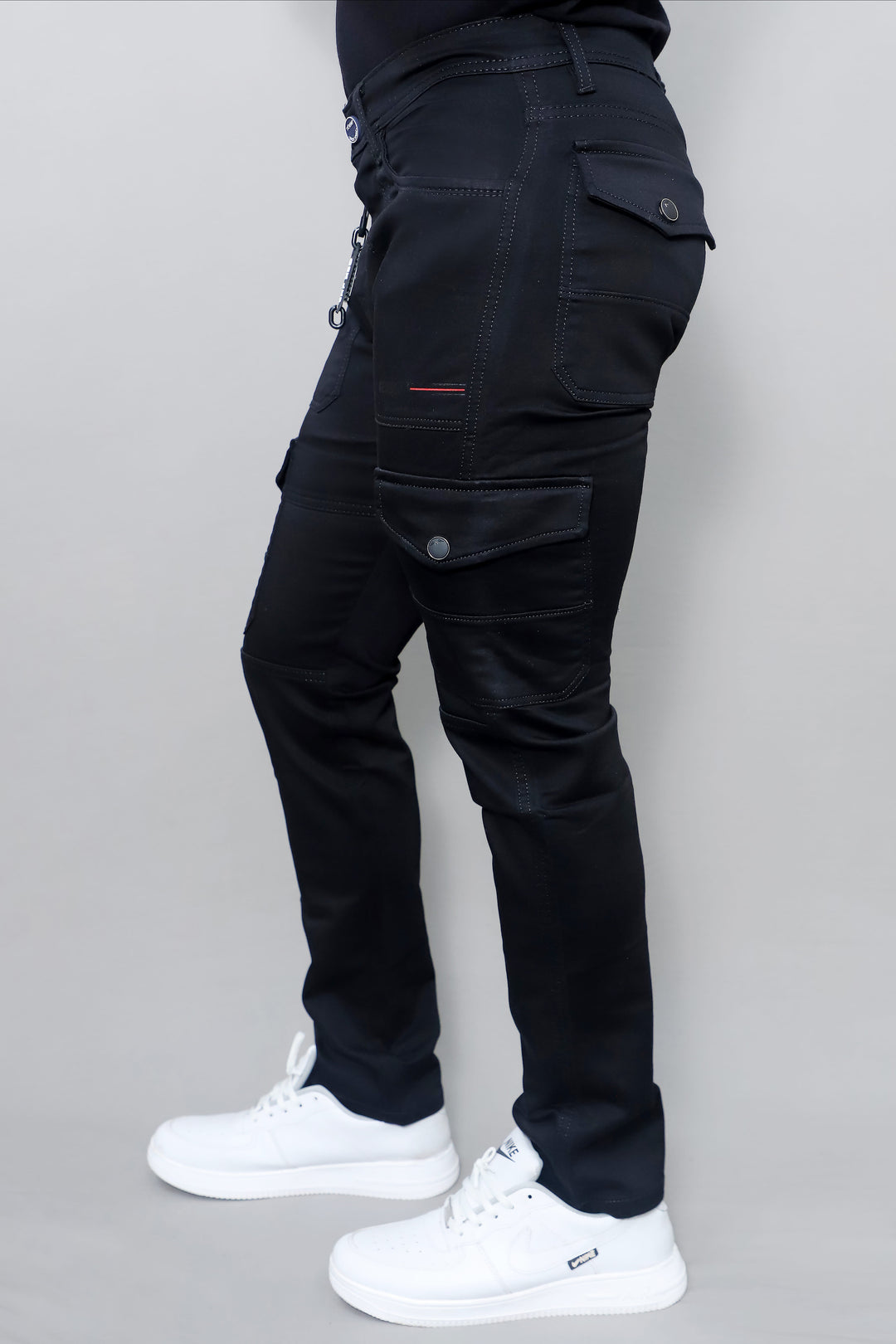 Side view of men's slim regular fit light blue distressed stretchable denim jeans E17