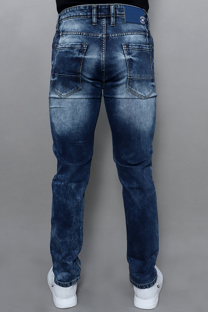 Close up of regular fit blue jeans for men mid rise comfort article no GEX  Plain Blue showing soft denim fabric texture