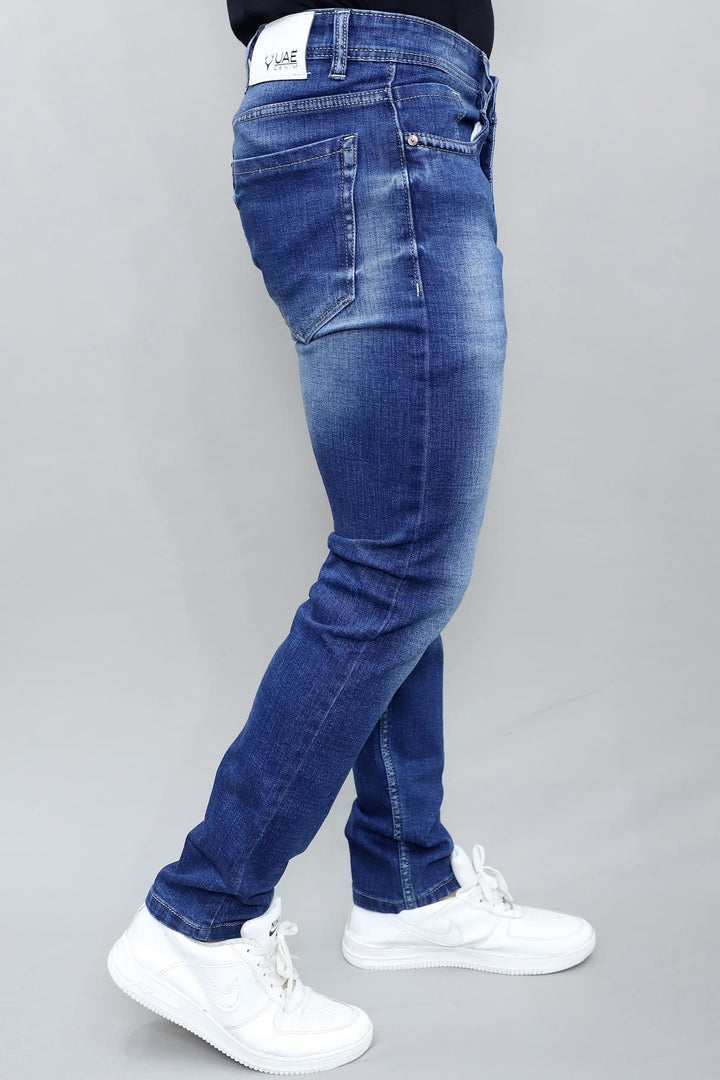 Close up of royal blue washed stretchable denim fabric in men's slim fit jeans E9
