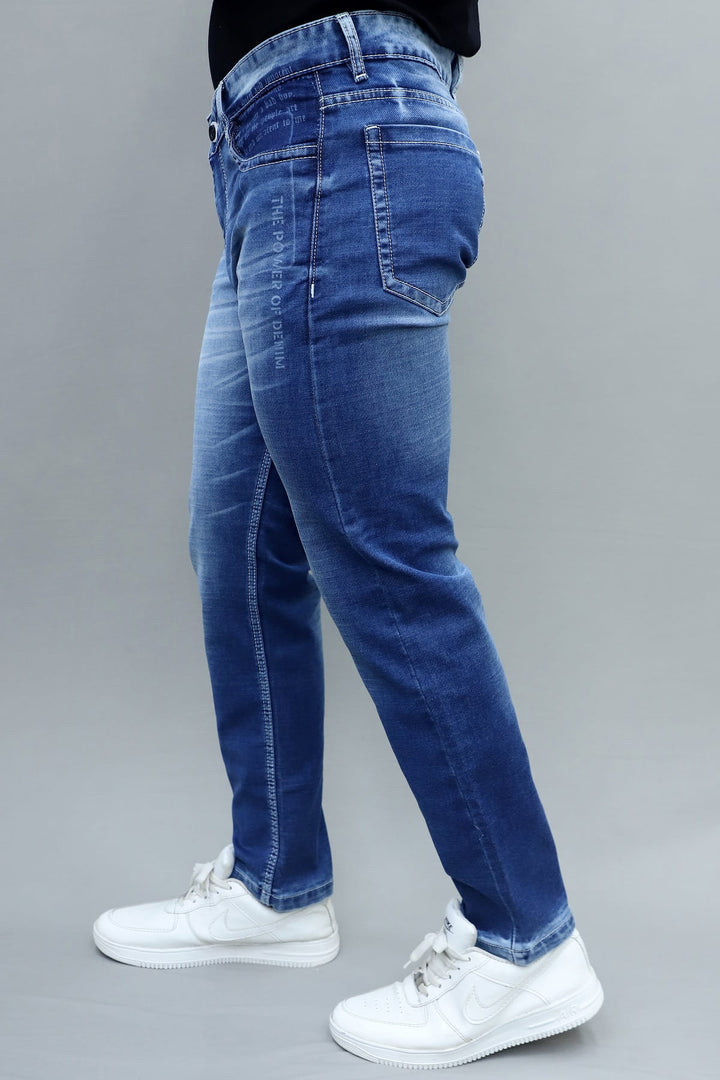 Full length view of slim fit premium dark blue washed stretchable denim jeans for men E-16