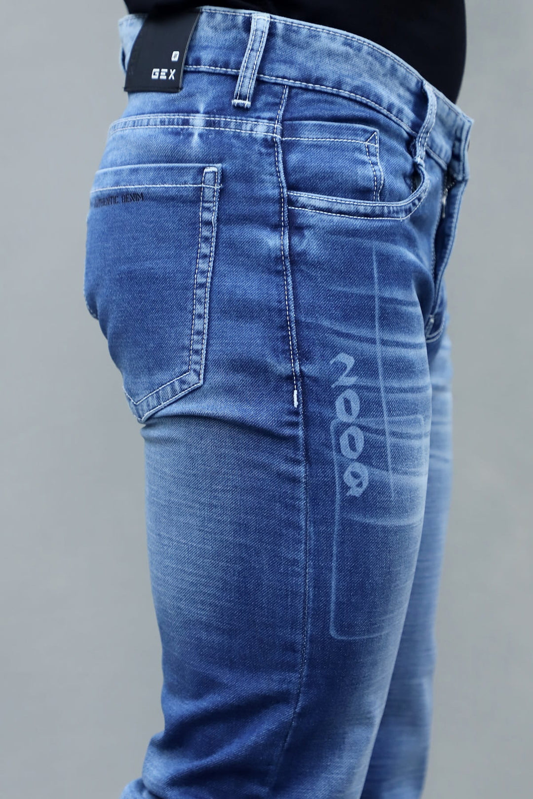 Side of slim fit premium dark blue washed stretchable denim jeans for men E-16